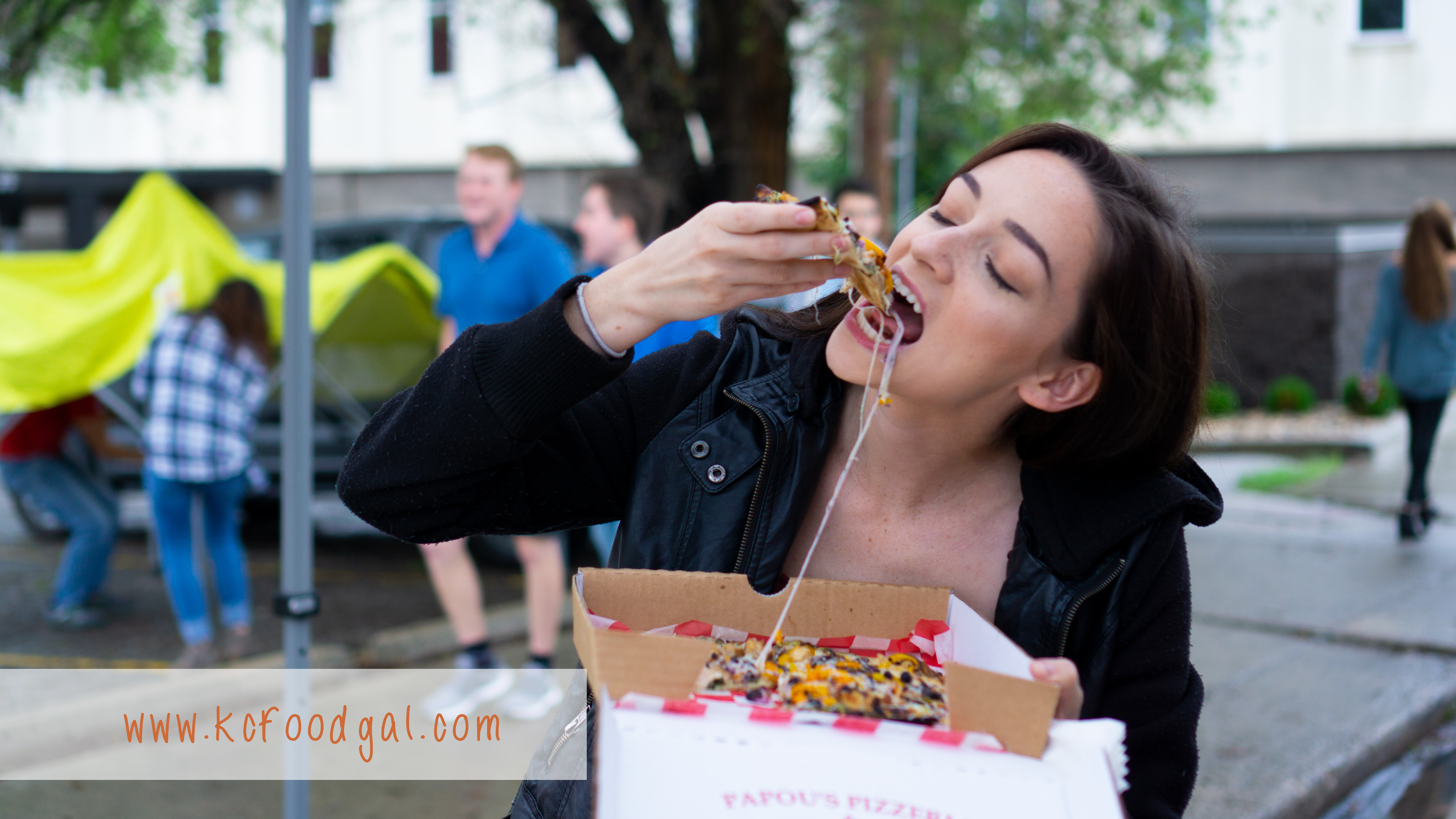 Jenae eating fooditude pizza